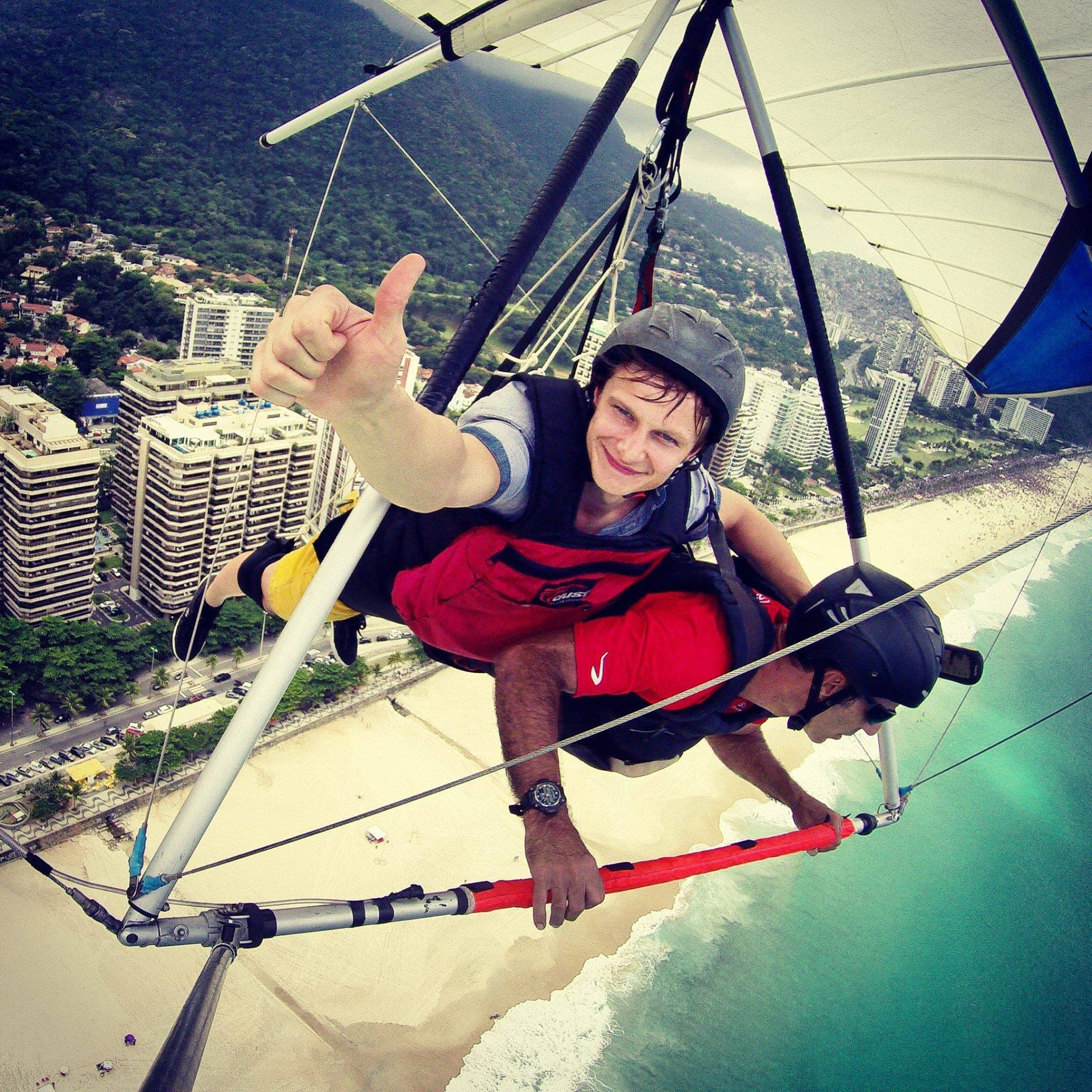 Paragliding over coastal hills in Brazil