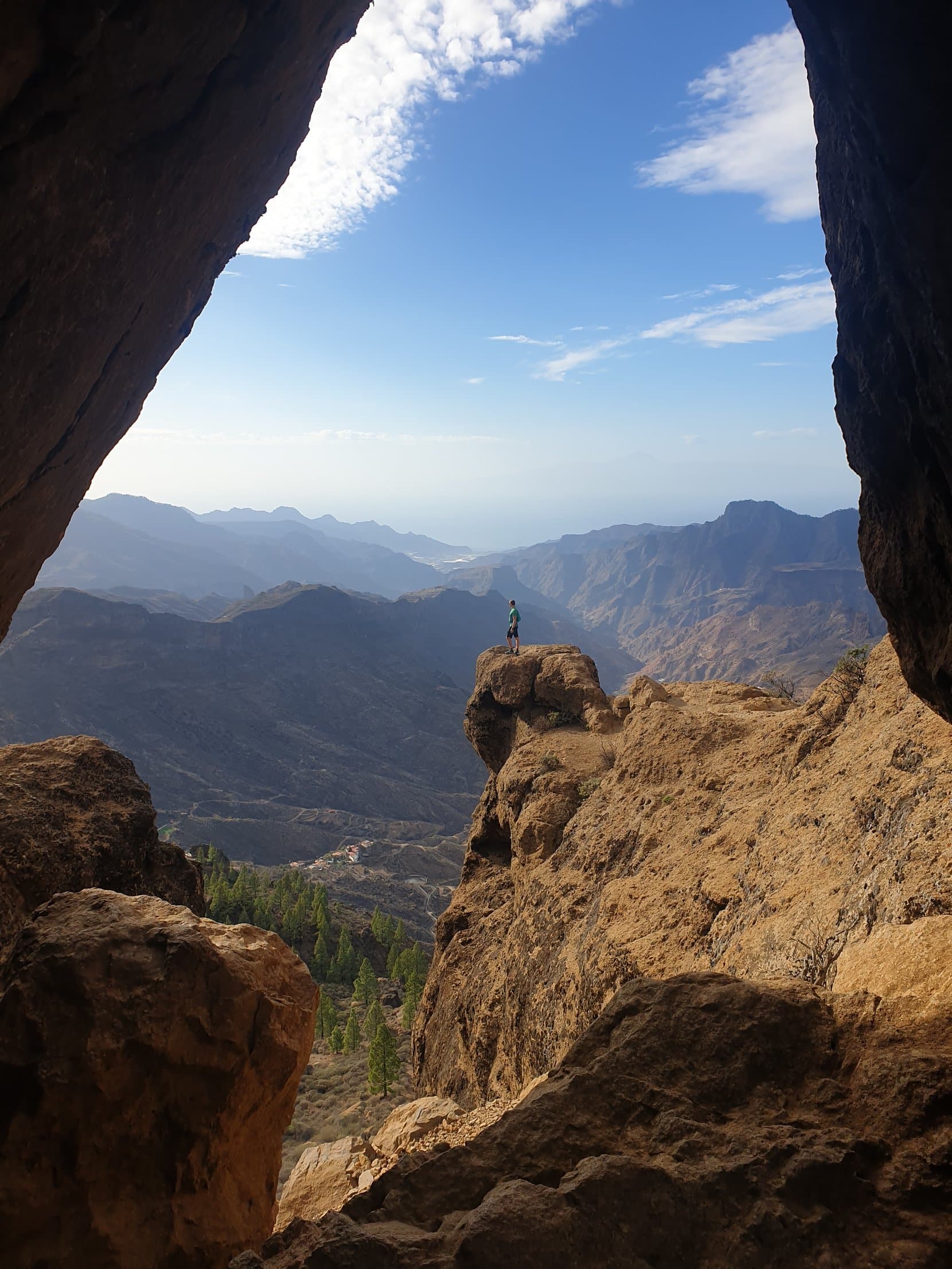 The mountain heart of Gran Canaria seen through a cave window near Roque Nublo
