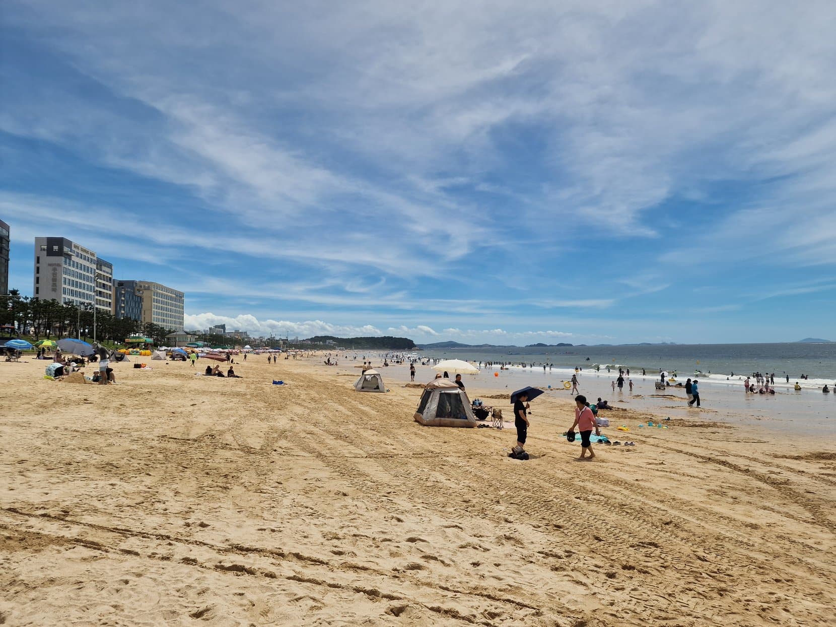 Daecheon Beach at Boryeong, sand, umbrellas and the Yellow Sea, South Korea