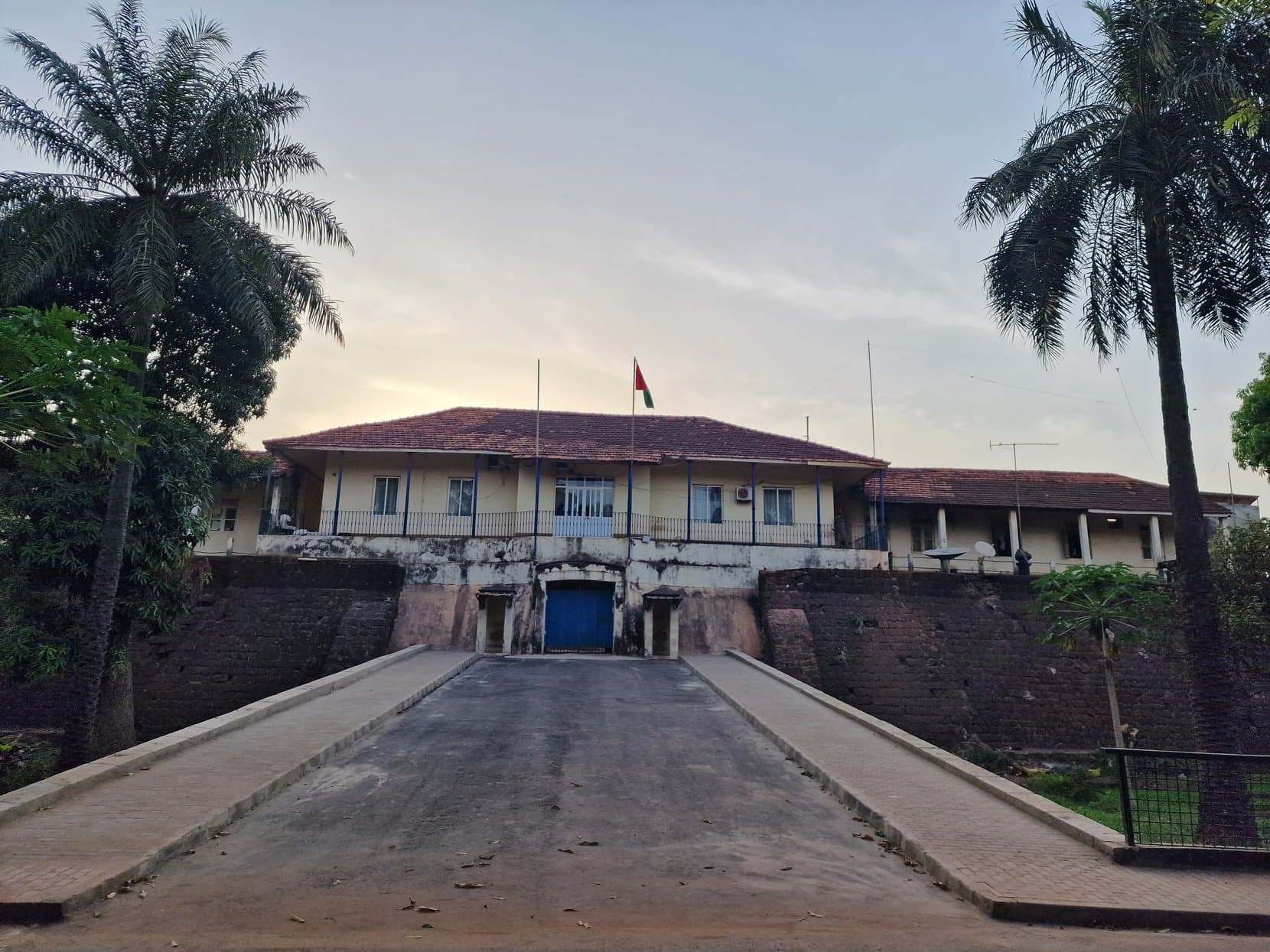 The ramp up to Bissau's fort with a flag flying above it