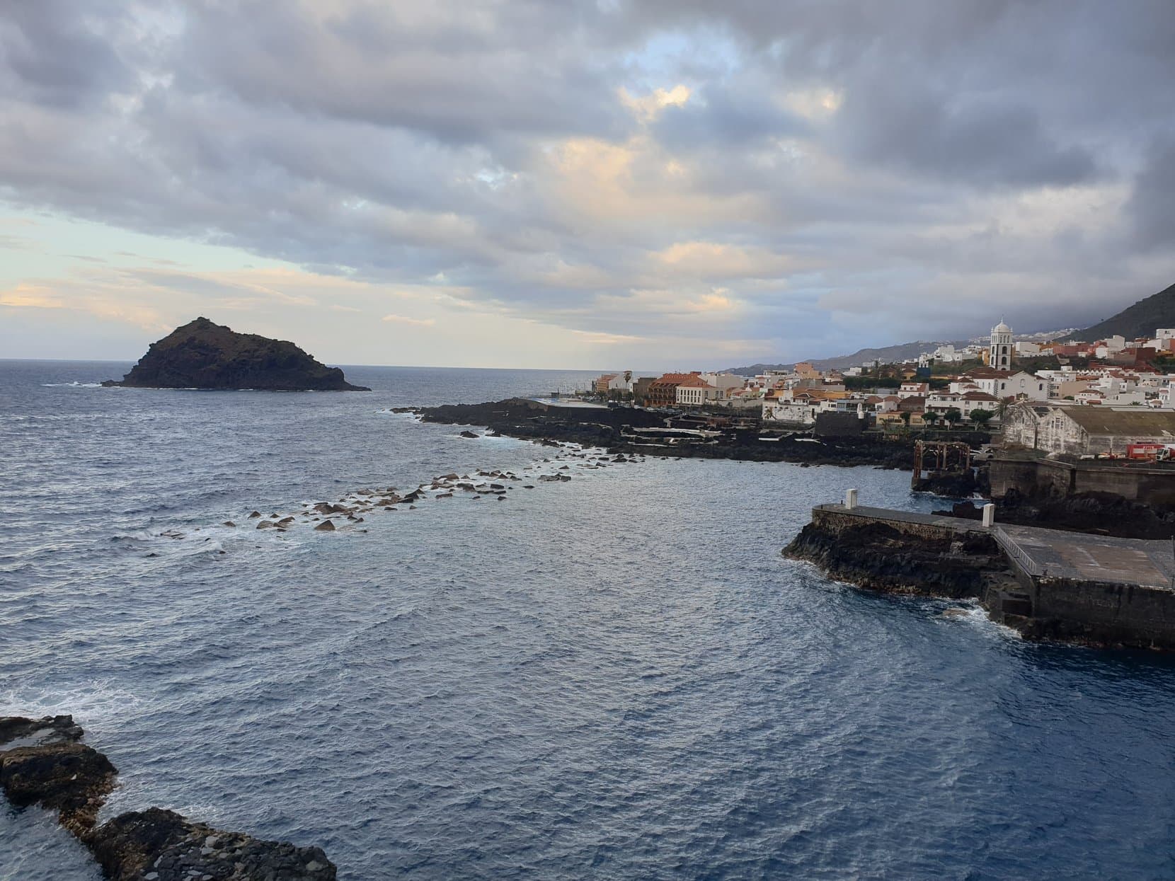 Garachico town and its offshore roque under an evening sky, Tenerife
