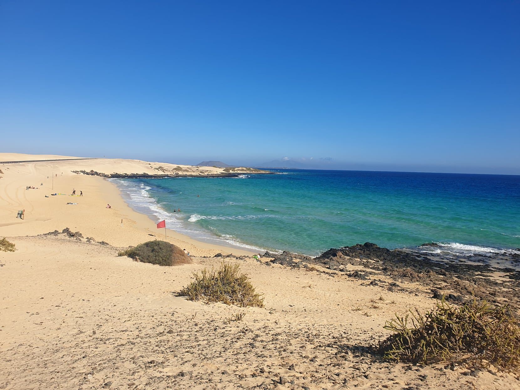 Turquoise water and white sand at Grandes Playas de Corralejo, Fuerteventura
