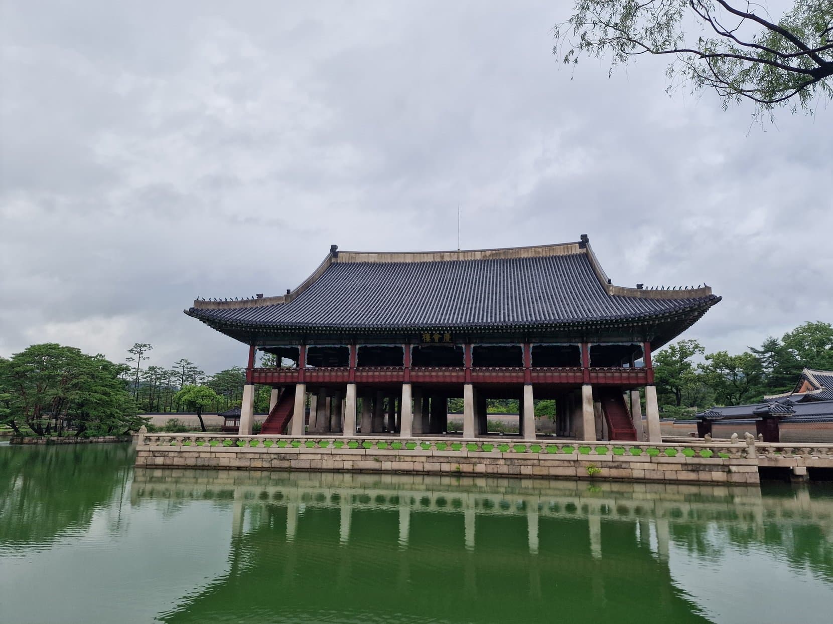 Gyeonghoeru pavilion standing on stone pillars in its pond at Gyeongbokgung palace, Seoul