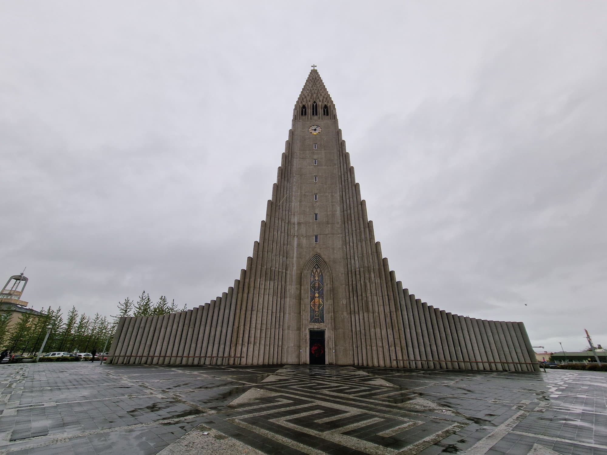 Hallgrímskirkja head-on from the plaza, its stepped concrete tower filling the frame