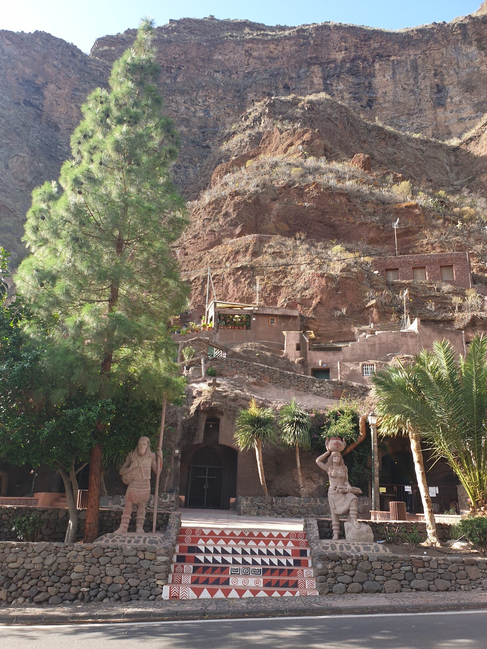 Cave houses built into the cliff at Montaña Las Tierras, Barranco de Guayadeque, Gran Canaria