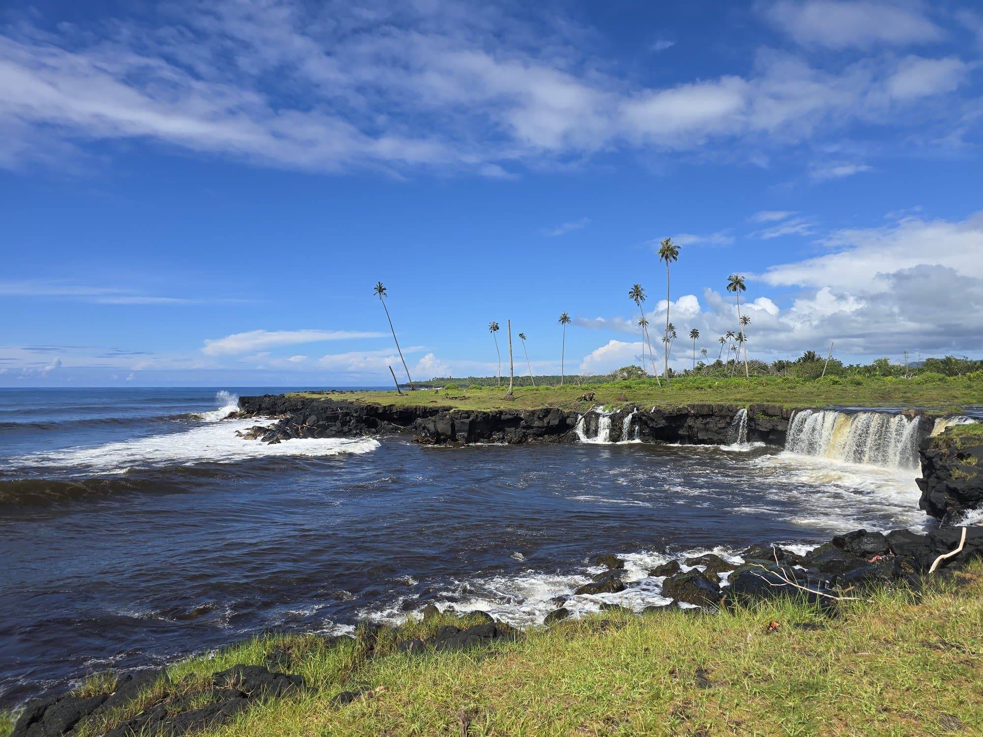 Mu Pagoa falls dropping over the lava edge into the sea on Savai'i