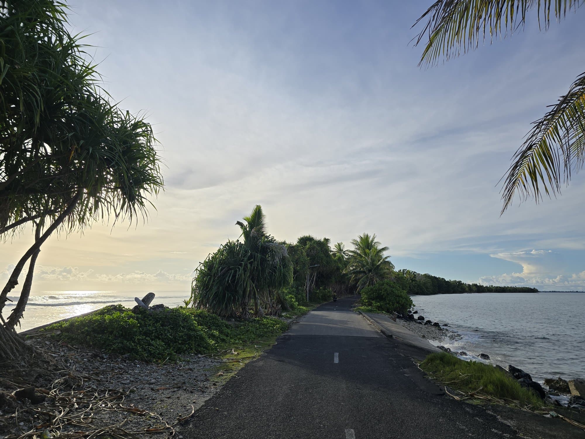 The road at Fongafale's narrowest point with the lagoon and the open Pacific on either side