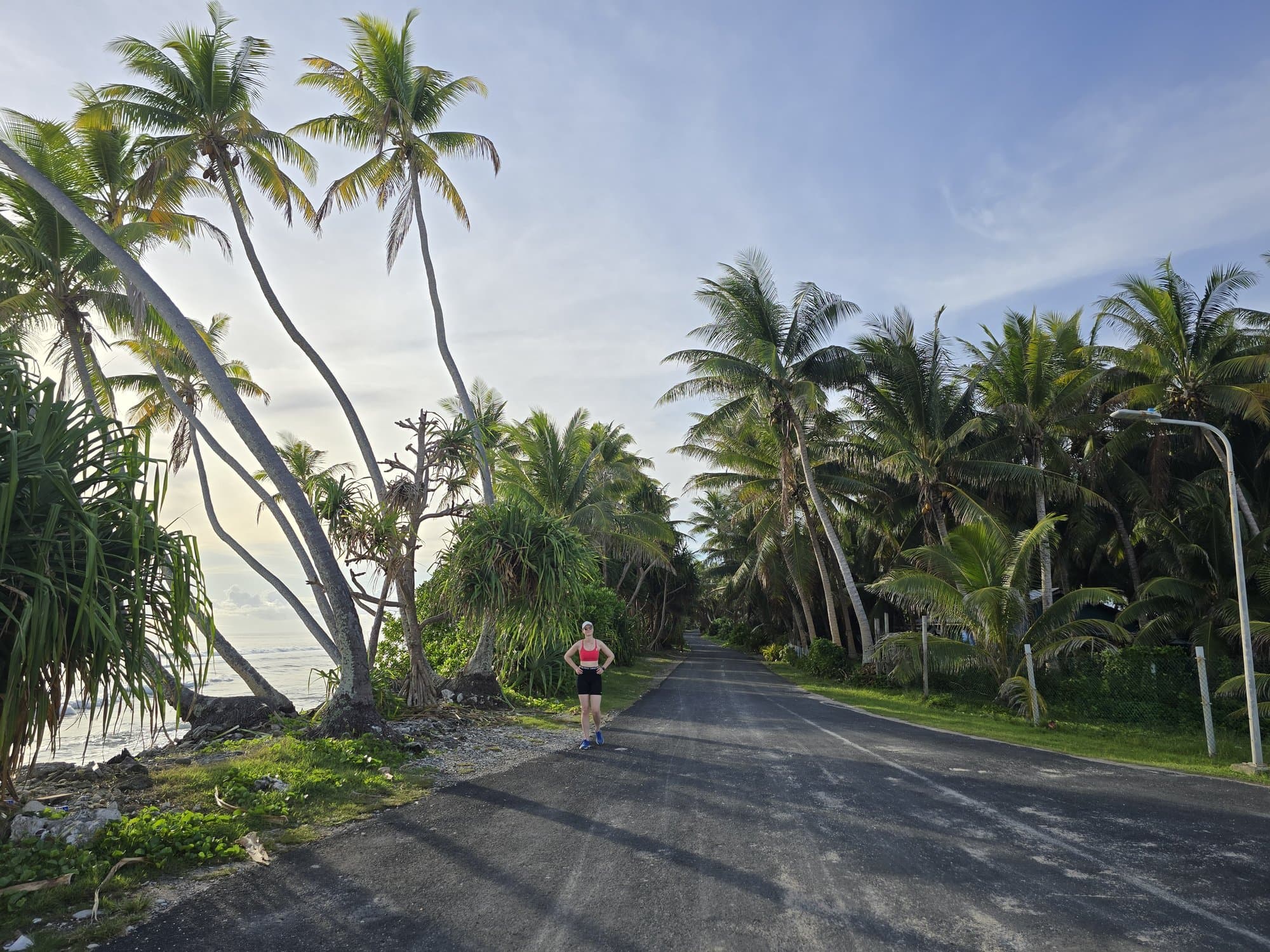 Running the palm-lined north road at dawn, Funafuti