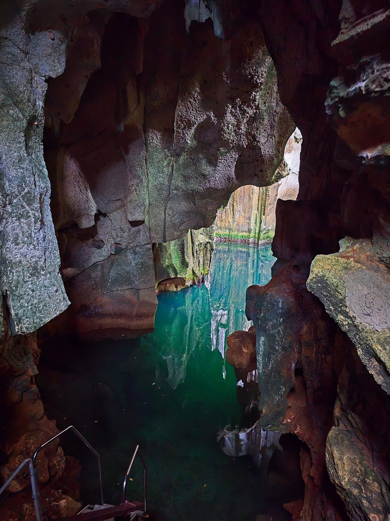 Green seawater inside the limestone chambers of the Sawa-i-Lau caves
