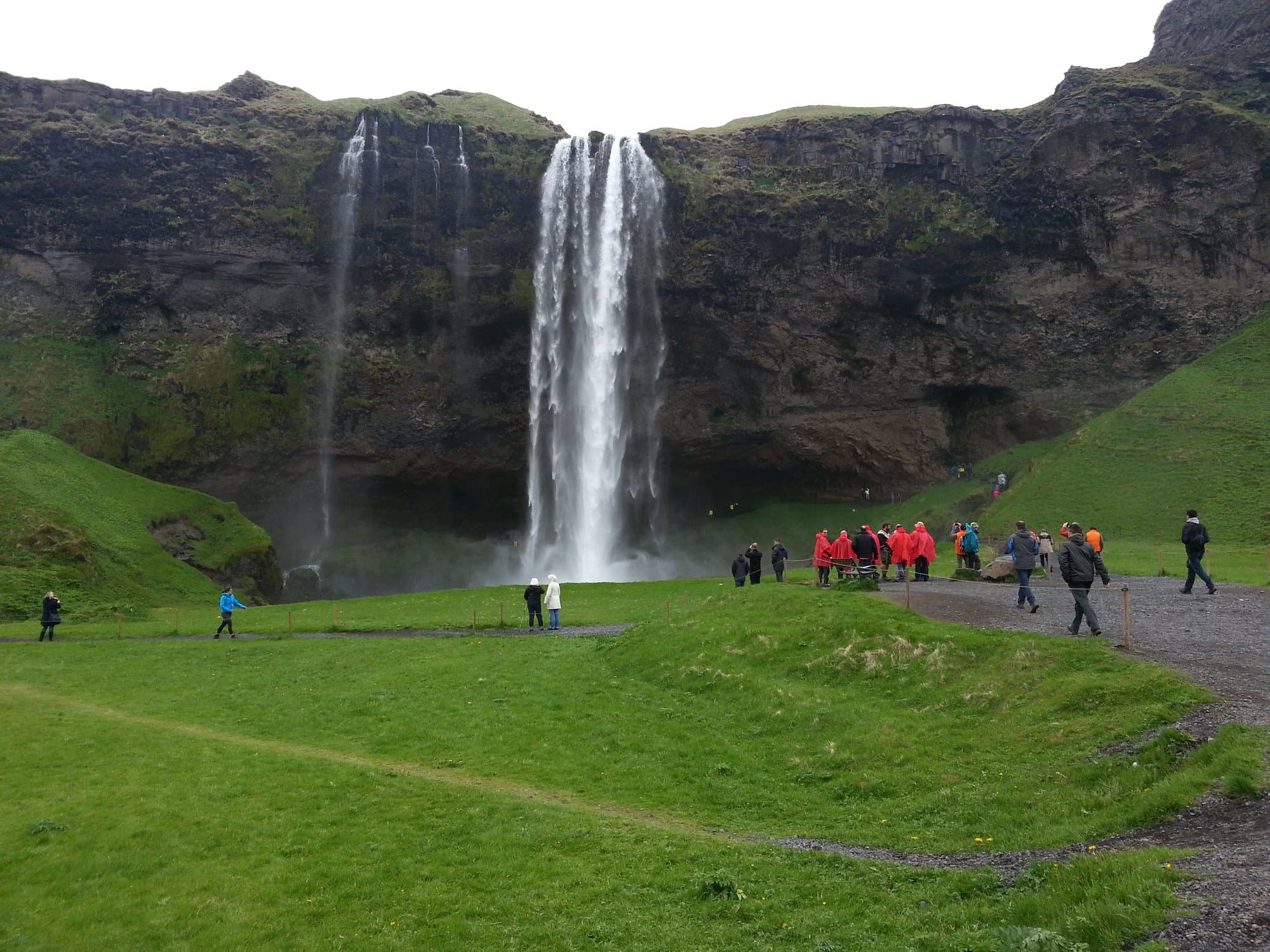 Seljalandsfoss falling in a curtain with the path running behind it, south Iceland