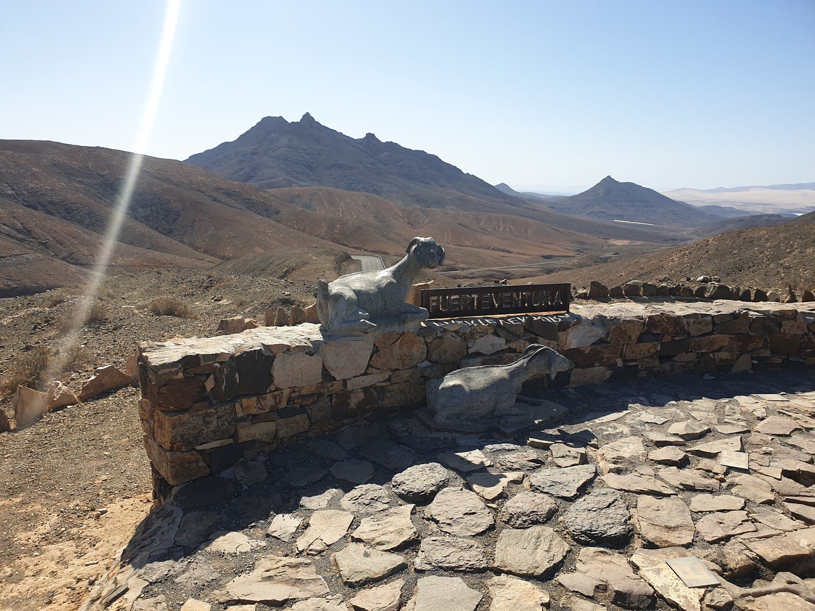 The goat monument at the Sicasumbre mirador over bare volcanic hills, Fuerteventura