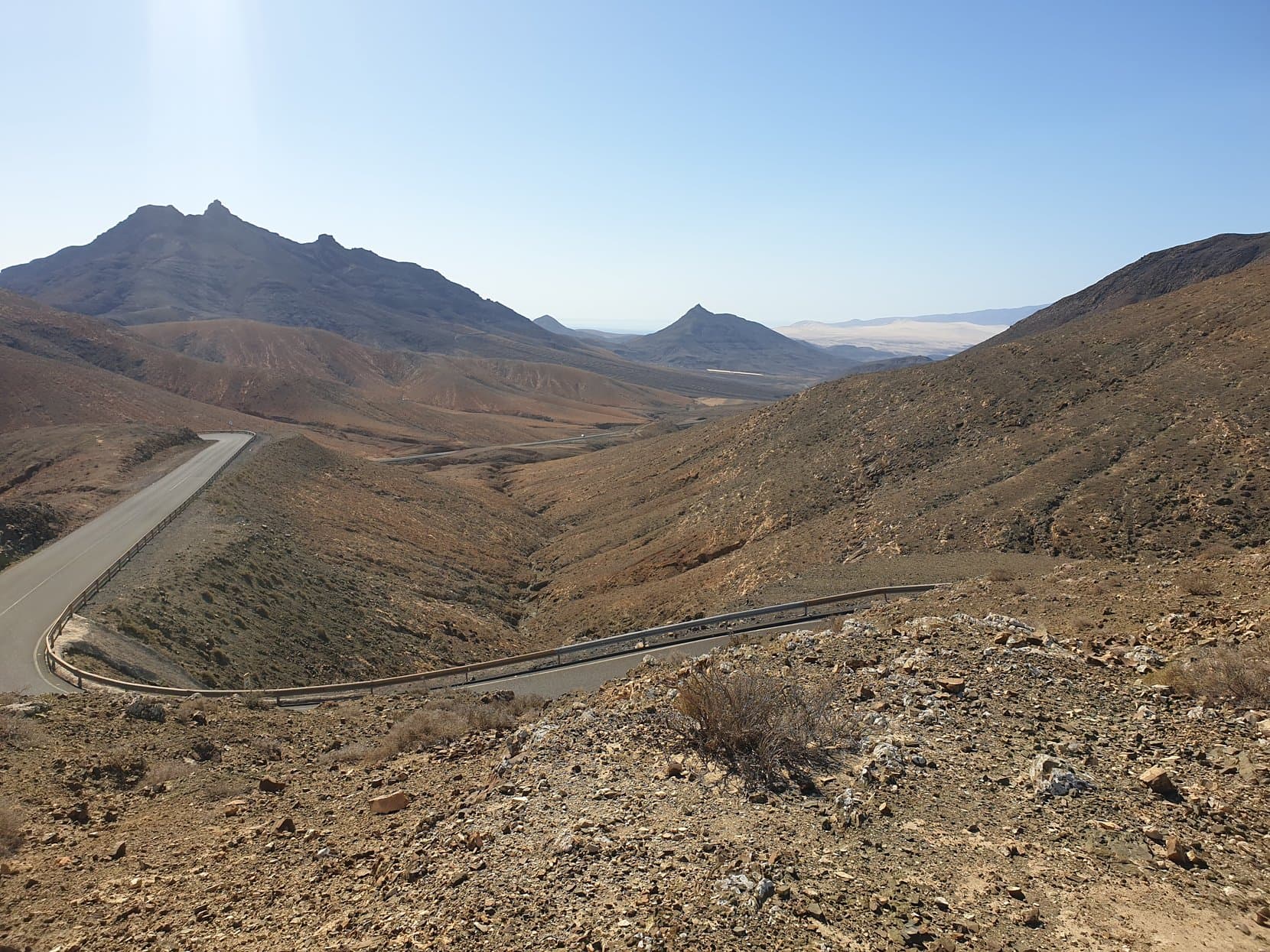 A road winding through the bare volcanic hills at Sicasumbre, Fuerteventura