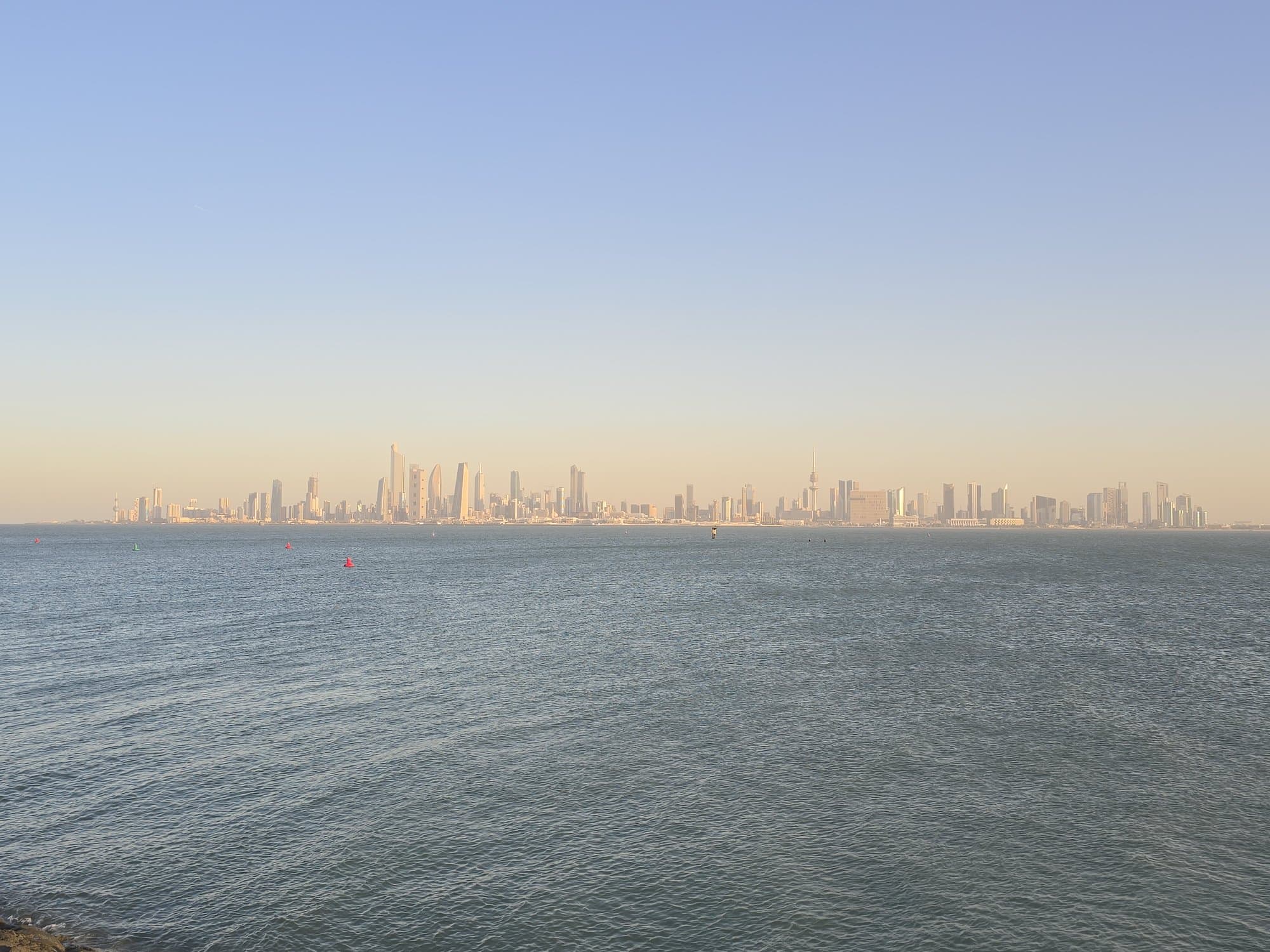The Kuwait City skyline across the water from the causeway
