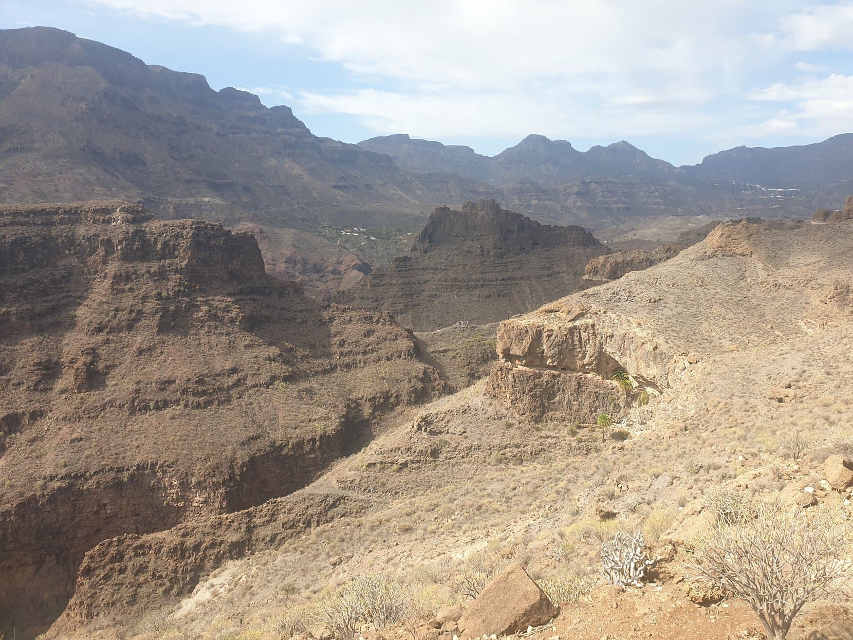 Bare layered ridges of a southeast barranco running toward the sea, Gran Canaria