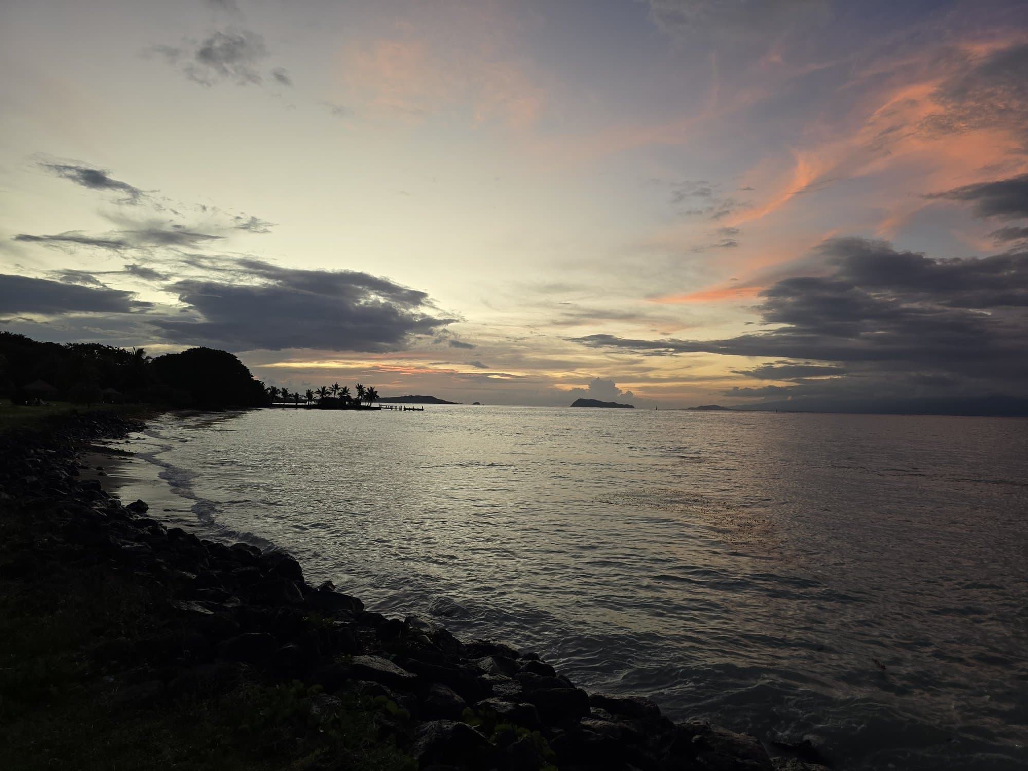 Sunset over the sea from Upolu's coast