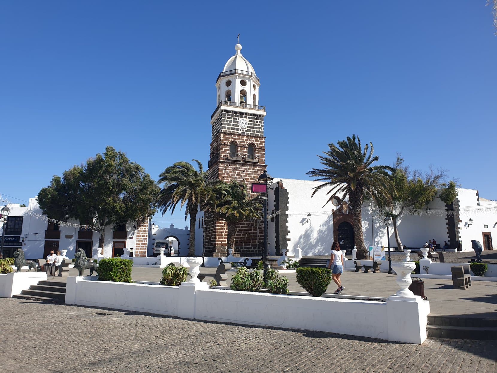 The church tower and palms on the plaza of Teguise, Lanzarote