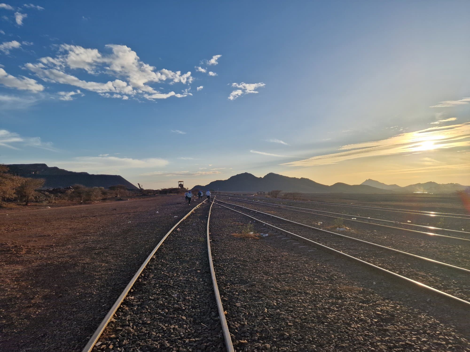 The iron-ore railway running to the horizon at dusk near Zouerat, Mauritania